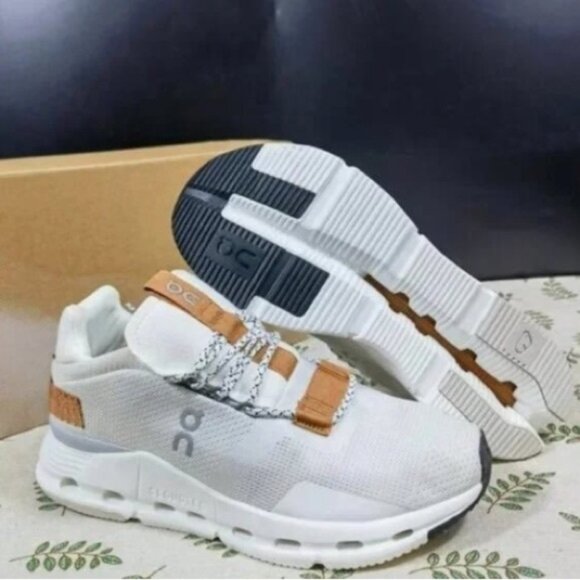 On Running White and Tan Shoes